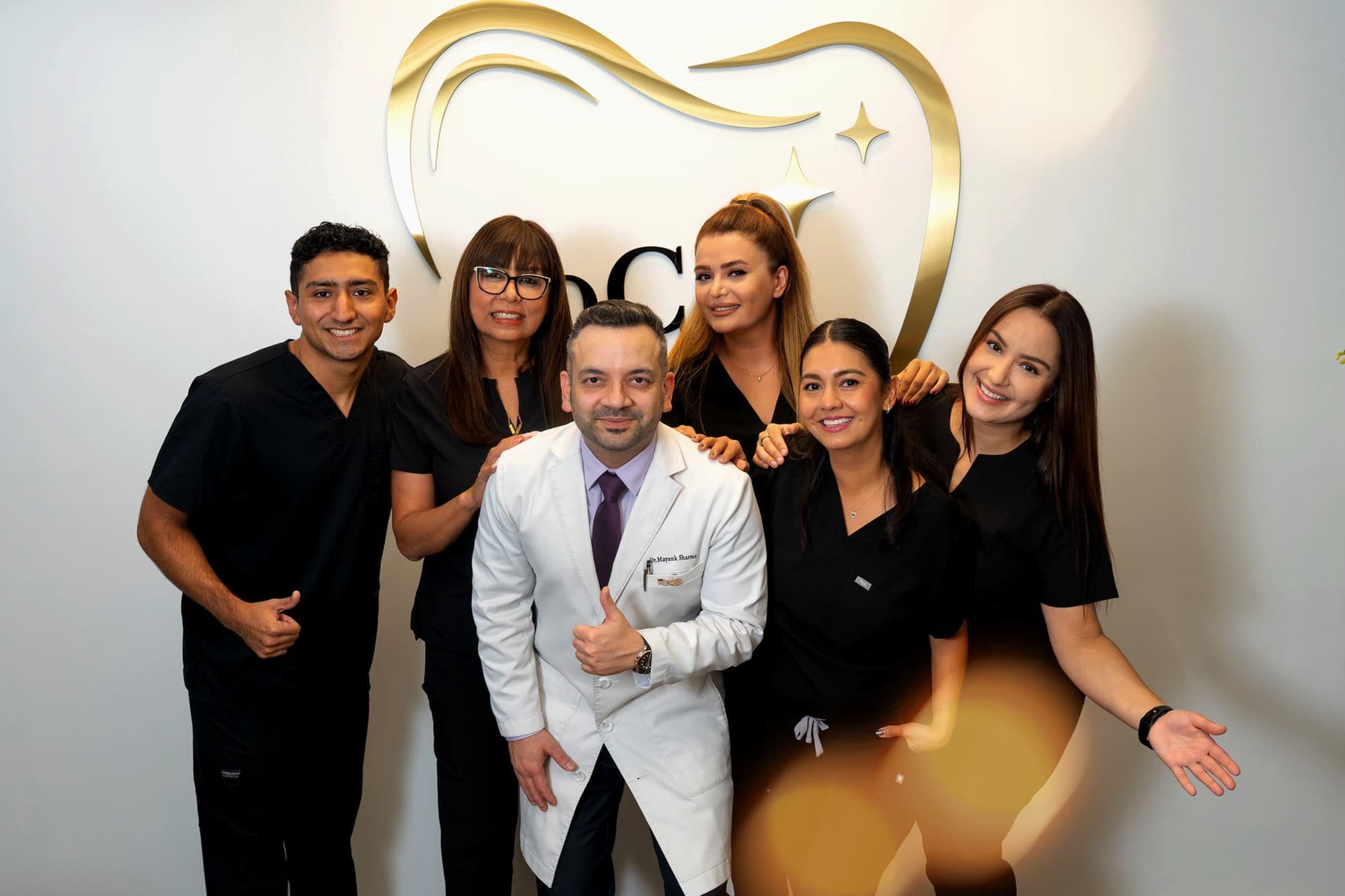 SoCal Prime Dentistry team members, including Dr. Sharma, showcasing a warm and friendly atmosphere, emphasizing personalized dental care in Rancho Santa Margarita.