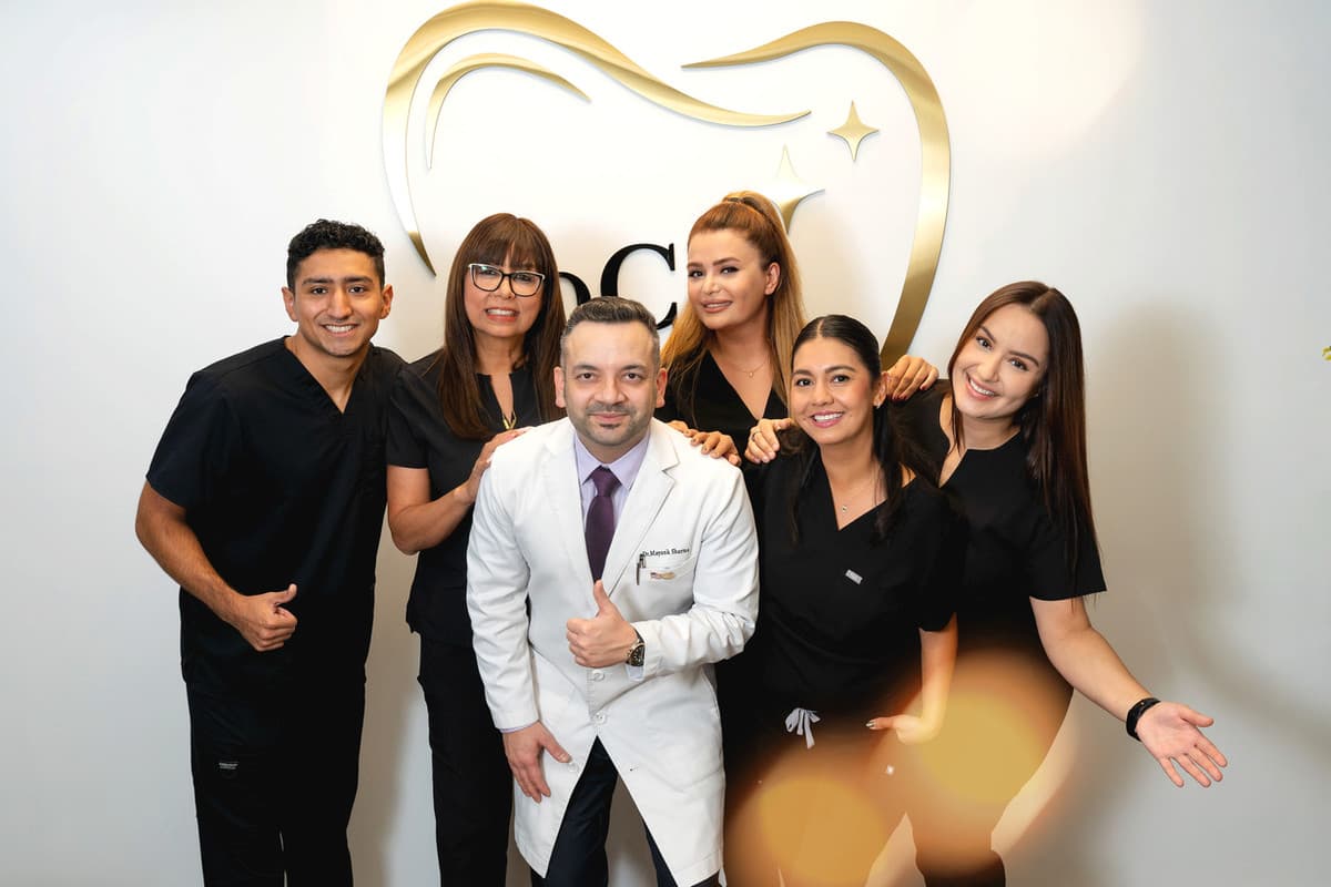 Dental team at SoCal Prime Dentistry, smiling and showcasing compassionate care in a welcoming environment.